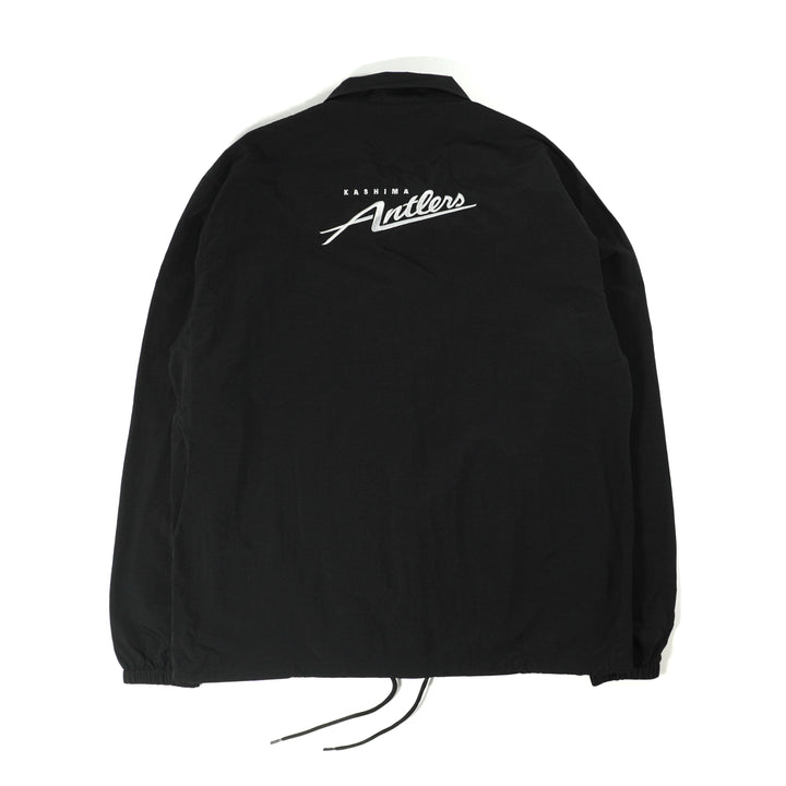 鹿島アントラーズ コーチジャケット（BLACK/NAVY）| 公式オンライン