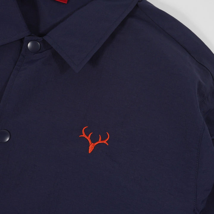 鹿島アントラーズ コーチジャケット（BLACK/NAVY）| 公式オンライン