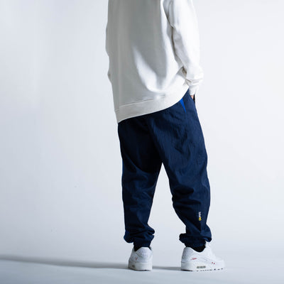 NIKE RPL T90 トラックパンツW（ミッドナイトネイビー）